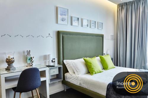 Postel nebo postele na pokoji v ubytování Incentro Rooms