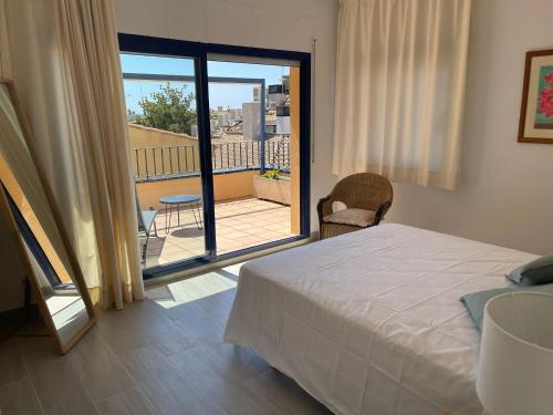 Ένα ή περισσότερα κρεβάτια σε δωμάτιο στο Apartamentos Marblau