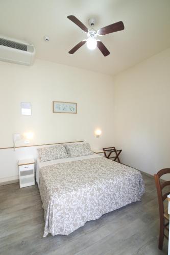 Postel nebo postele na pokoji v ubytování Hotel Miriam