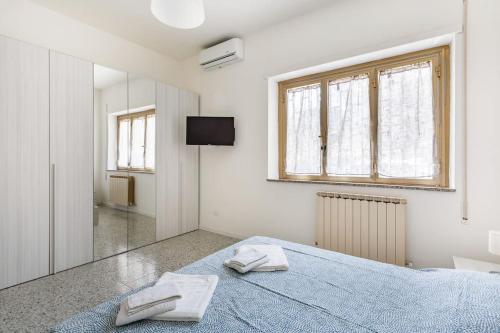 Posteľ alebo postele v izbe v ubytovaní CASA BOLOGNETTA