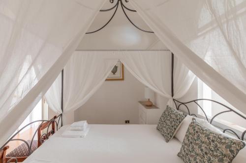 a bedroom with a bed and a window at iFlat Modern apartment in the Monti area in Rome