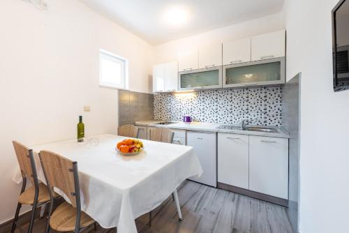 Η κουζίνα ή μικρή κουζίνα στο Apartment Fiorenini
