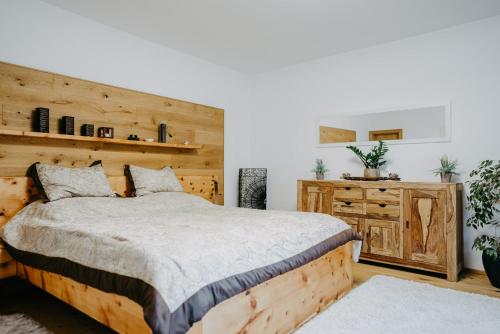 Katil atau katil-katil dalam bilik di Apartment RADO 75m2 mit Garten und Terrasse