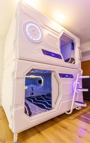 a white bunk bed in a room at We Hostel Palma - Albergue Turístico in Palma de Mallorca