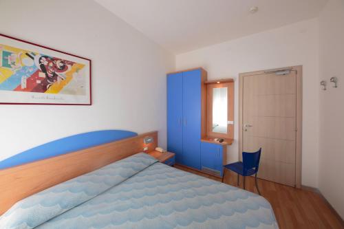 Кровать или кровати в номере Hotel Riviera