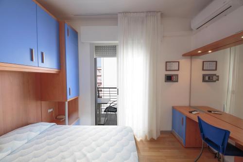 Кровать или кровати в номере Hotel Riviera