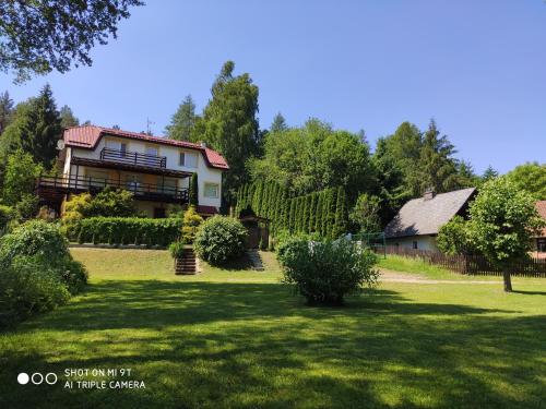 Κήπος έξω από το Mazury całoroczny dom do wynajęcia nad jeziorem Sasek Wielki