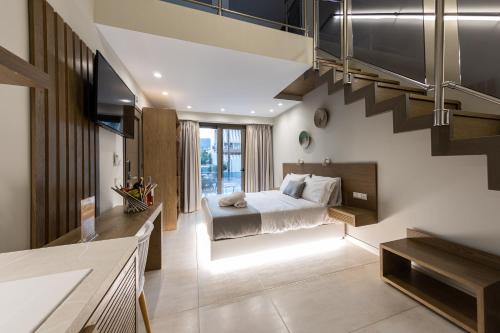 Postel nebo postele na pokoji v ubytování Ammos Luxury Apartments