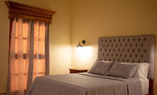 Katil atau katil-katil dalam bilik di GRAN HOTEL VICTORIA