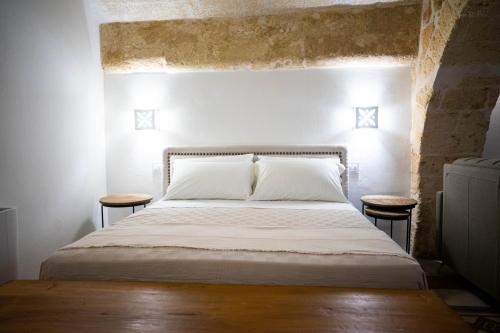 Posteľ alebo postele v izbe v ubytovaní La Rosa