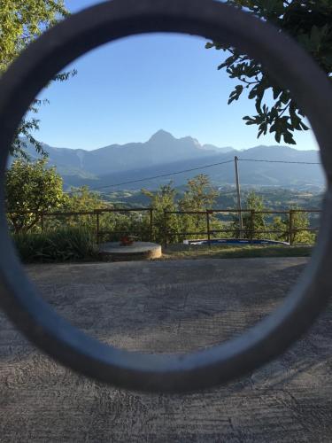 a view of the mountains through a magnifying glass at Agriturismo Bellavista in Ronzano