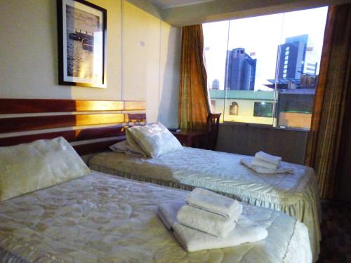 Hotel JKalixtoにあるベッド