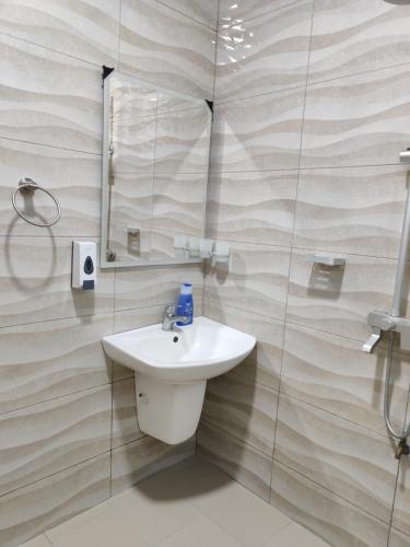 Vonios kambarys apgyvendinimo įstaigoje FAD Home & Apartments