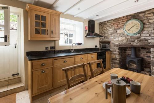 Køkken eller tekøkken på Bluebird Cottage