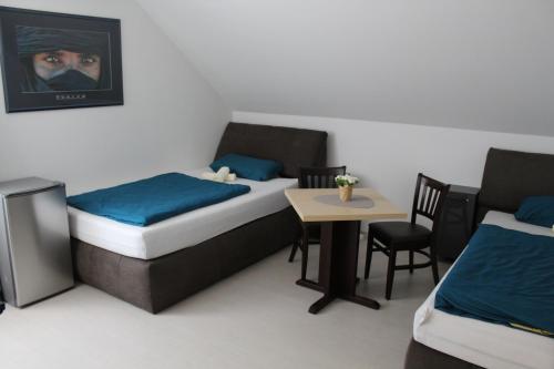 Katil atau katil-katil dalam bilik di Marstall Apartmenthaus Kassel