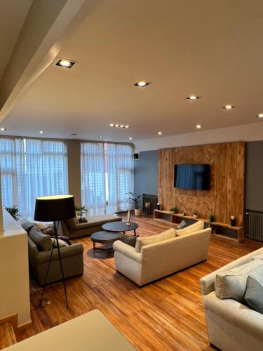 TV a/nebo společenská místnost v ubytování Hotel Aspen Ski by bund