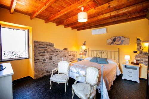 Postel nebo postele na pokoji v ubytování Casa di MOMO