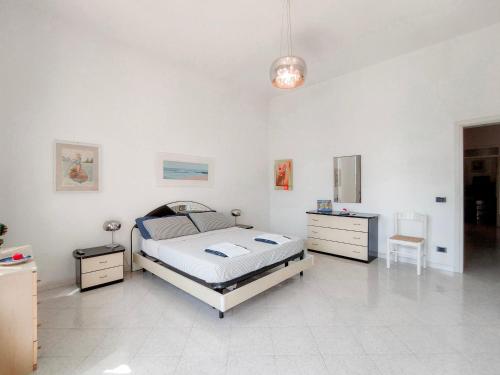 מיטה או מיטות בחדר ב-Casa Tanna