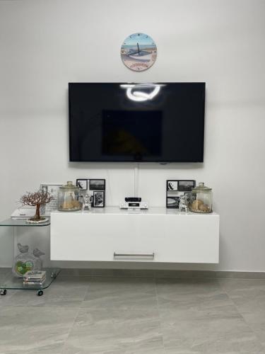 Televízia a/alebo spoločenská miestnosť v ubytovaní Trogir Apartment Nela