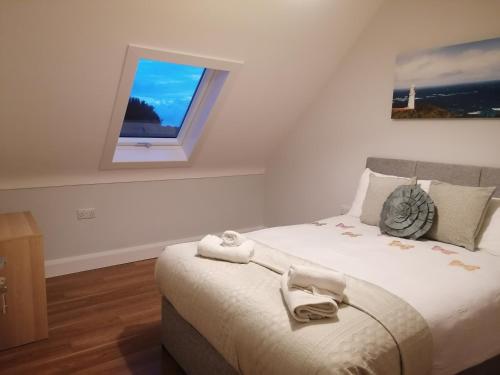 Postel nebo postele na pokoji v ubytování Atlantic way Apartment 1