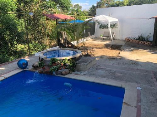 Foto sihtkohas Agua de Dios asuva majutusasutuse Villa Rubens, Casa familiar con piscina privada galeriist