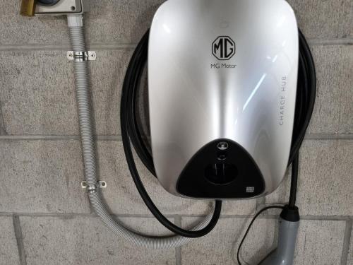 a water heater is hooked up to a wall at Sacred Waters Taupo in Taupo