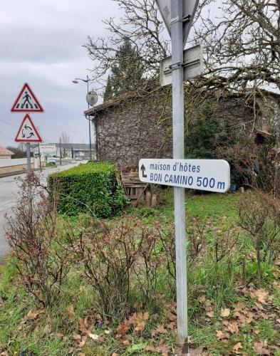 a street sign on the side of a road at Bon camino in Moissac