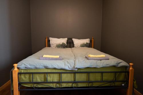 Postel nebo postele na pokoji v ubytování River Apartment