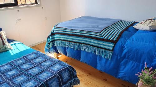 Cabaña El Avellanoにあるベッド