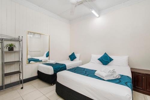 Postel nebo postele na pokoji v ubytování Strand Motel