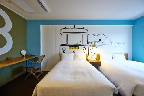 Кровать или кровати в номере 8 Hotel Shonan Fujisawa