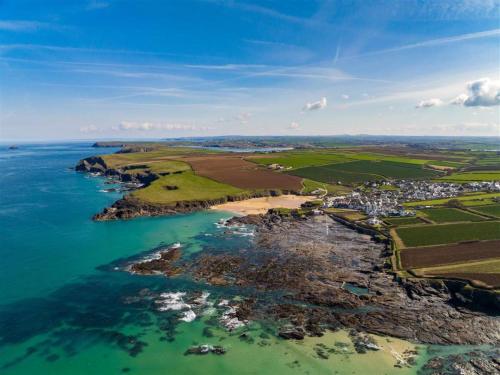 an aerial view of the ocean and a coastline at Number One - The Old Stables in Wadebridge