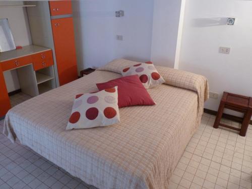 Ένα ή περισσότερα κρεβάτια σε δωμάτιο στο Aprea Apartments