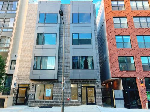 an apartment building on the corner of a street at Stay at Luna on Ridge Ave in Philadelphia