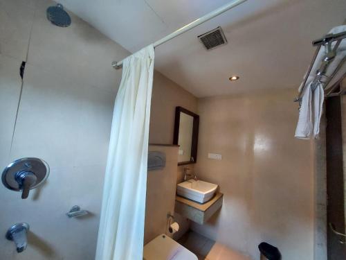 Koupelna v ubytování Orbit Hotel - Bagdogra