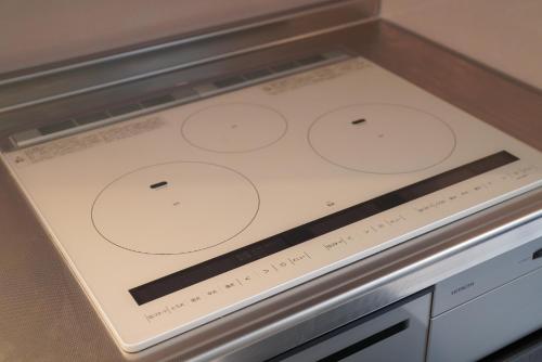 a stove top with four circles on it at 桔恭(KIKYO) in Otaru