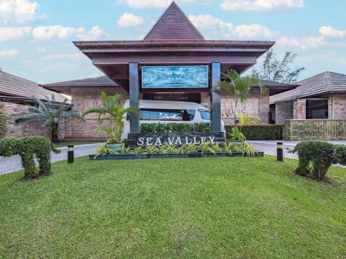 a house with a sign that reads seavillian at Sea Valley Resort in Lipa Noi