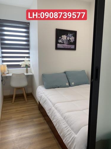 Cama o camas de una habitación en Căn Hộ TMS 28 Nguyễn Huệ - Xuan Phuong House