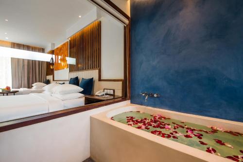 Postel nebo postele na pokoji v ubytování Metta Residence & Spa