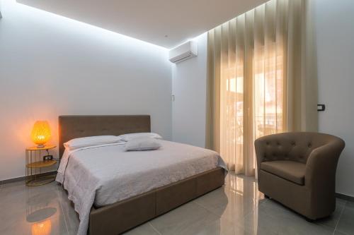 Postel nebo postele na pokoji v ubytování Appartamento a due passi dal mare