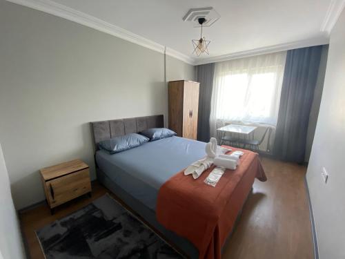 Postel nebo postele na pokoji v ubytování ANA GÜNEY Apart Otel