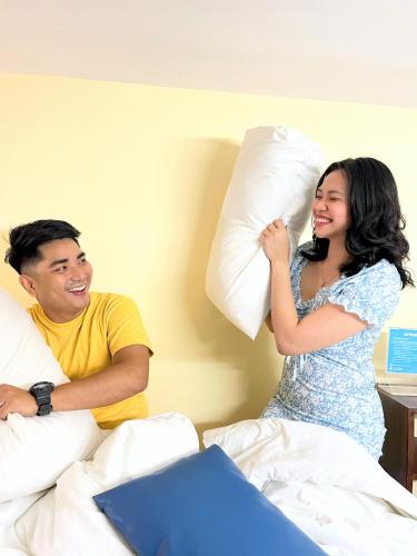 Katil atau katil-katil dalam bilik di airobedz MANILA - A Value Hotel