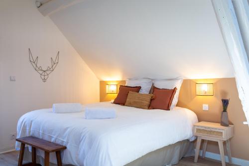 Posteľ alebo postele v izbe v ubytovaní Cosy Chambord à 10 minutes du château