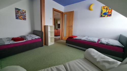 Postel nebo postele na pokoji v ubytování Apartmán Lidická