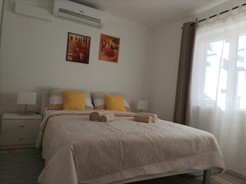 Posteľ alebo postele v izbe v ubytovaní Apartman Periska