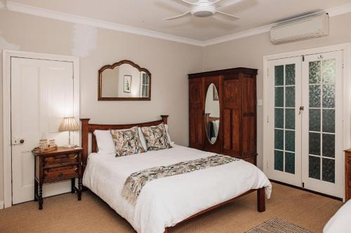Ένα ή περισσότερα κρεβάτια σε δωμάτιο στο Hope Farm Guesthouse