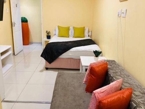 Katil atau katil-katil dalam bilik di Mowetu Guest House
