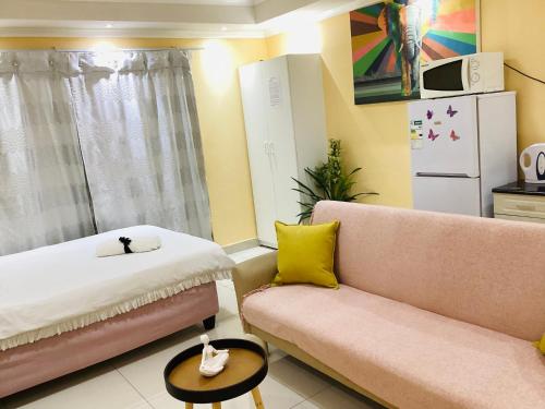 Katil atau katil-katil dalam bilik di Mowetu Guest House