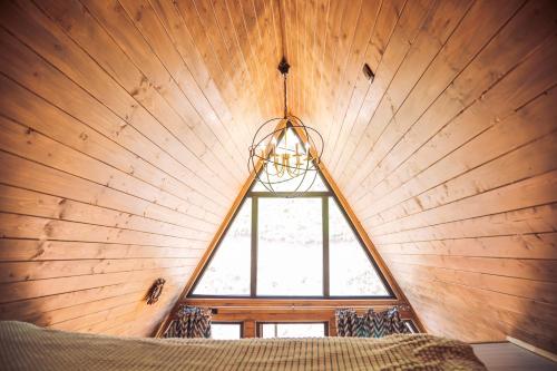 En eller flere senge i et værelse på Nasha Dacha