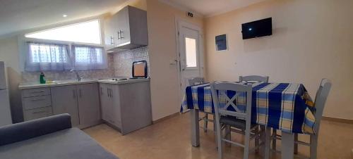 Kuchyň nebo kuchyňský kout v ubytování Xanthoula Studios